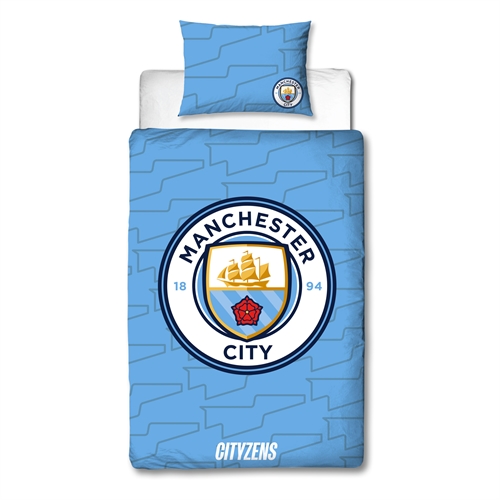 Manchester City sengetøj - Blåt vendbart sengesæt med logo - 140x200 cm - 100% bomulds sengelinned - Fodbold sengetøj